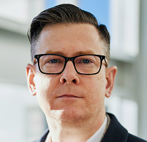 Alexander Hughes, PDG d'une entreprise spécialisée en cryptomonnaies, portrait